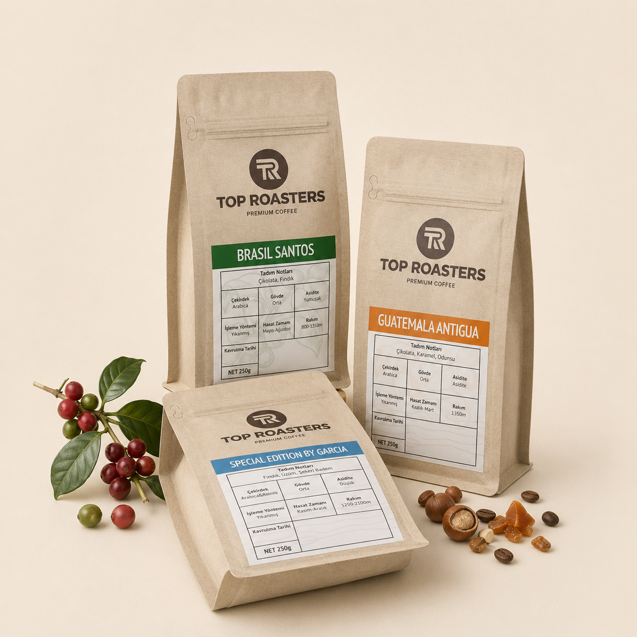 Top Roasters tek orjin kahve serisi: Brasil Santos, Guatemala Antigua ve Special Edition by Sancob, kahve kirazı dalı ve çekirdeklerle krem zemin üzerinde